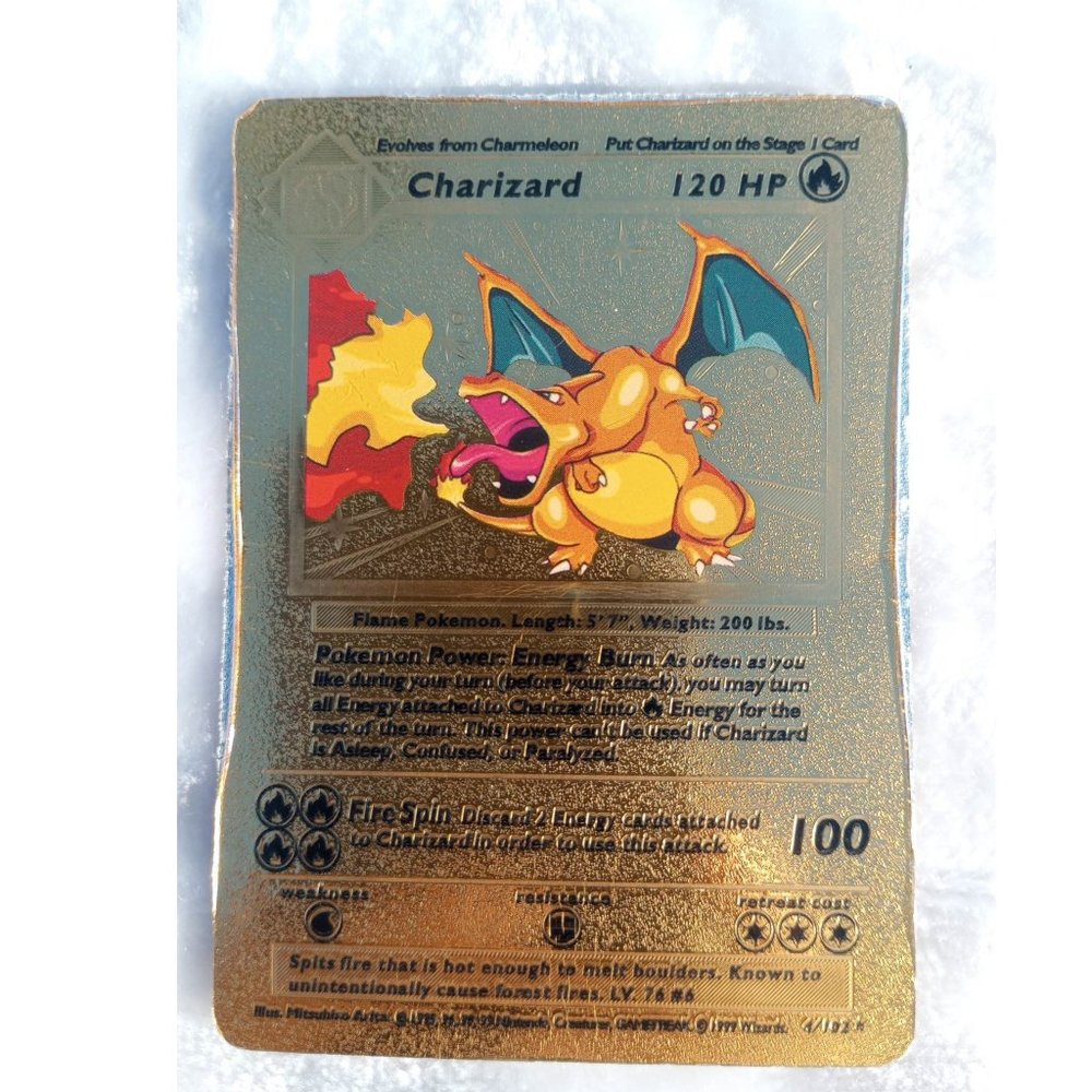Charizard evolves from charmeleon Gold Foil Pokémon Card Number4/102